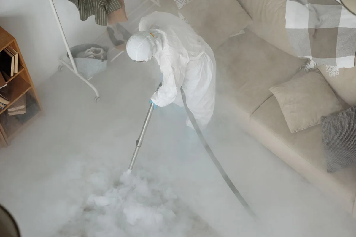 Biohazard cleanup technician in protective equipment, North Wildwood, NJ